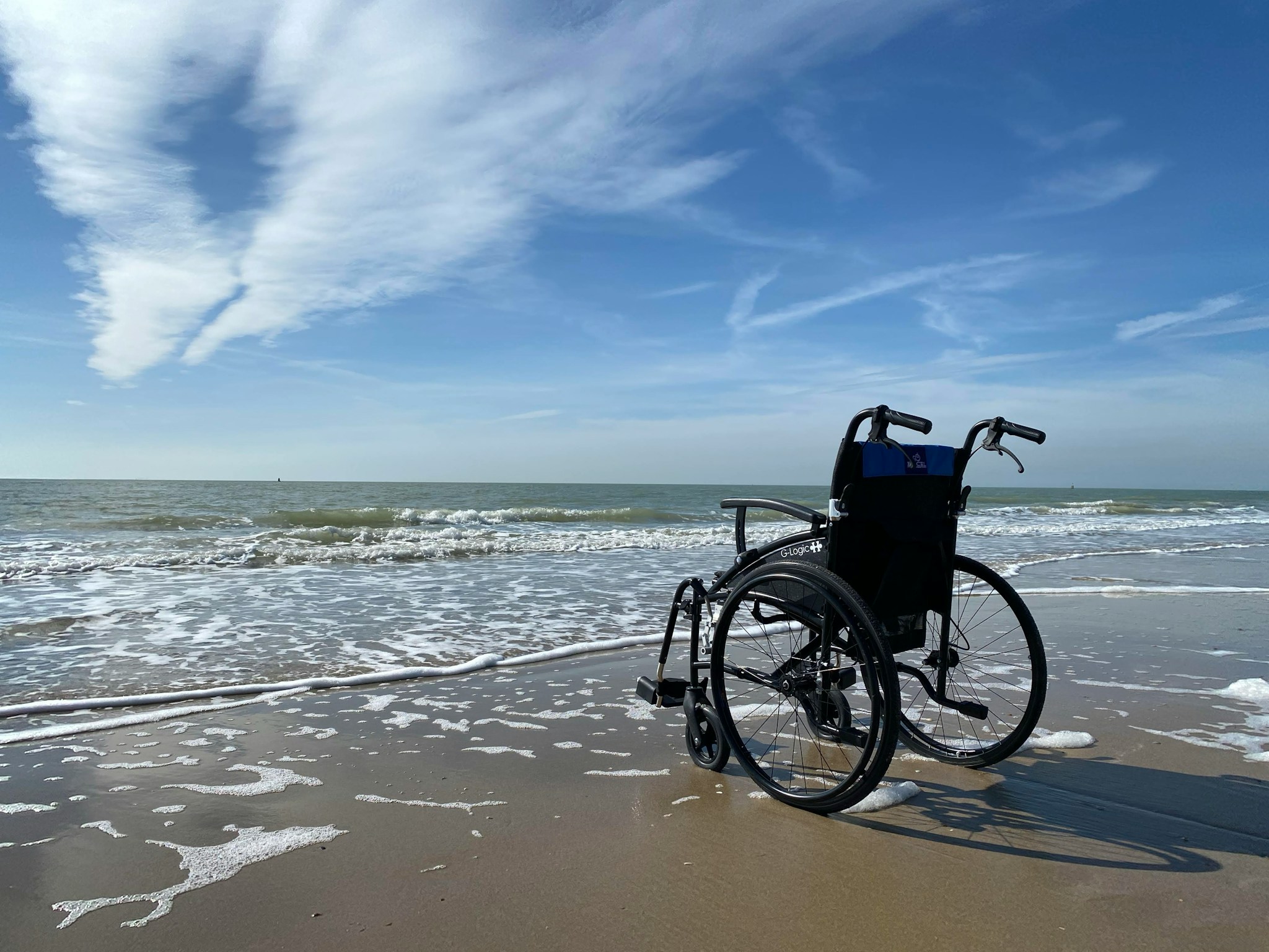 WHEELCHAIR ON BEACH